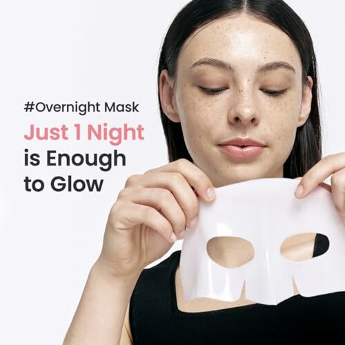 Woman holding an overnight face mask with text about glowing skin.